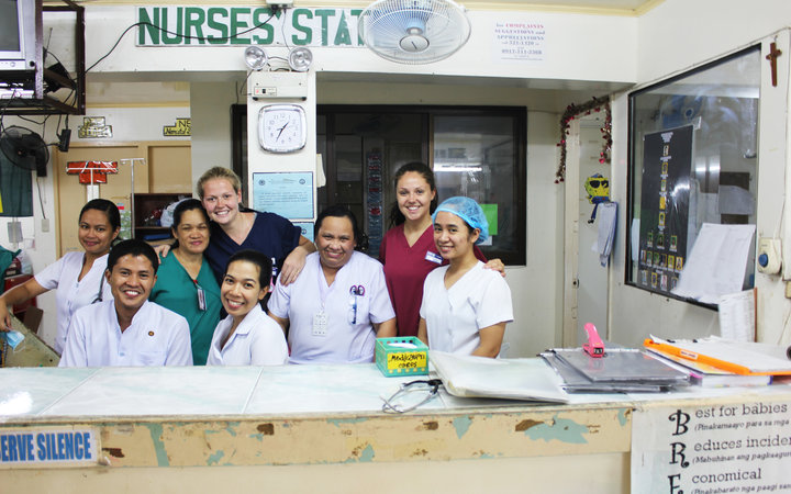 Students with their nursing supervisors in Iloilo